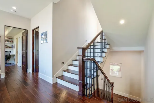 a lobby with furniture and flowers