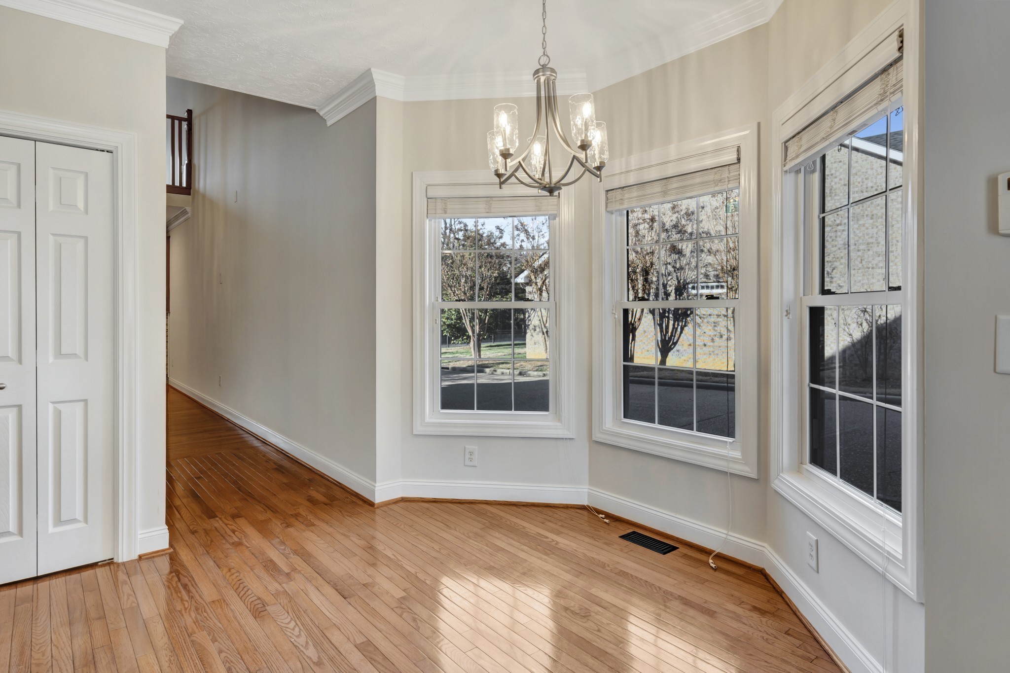 1900 Tinnin Road, Unit A5 Goodlettsville, TN 37072 - Photo 11 of 41 a view of an empty room with wooden floor and a window
