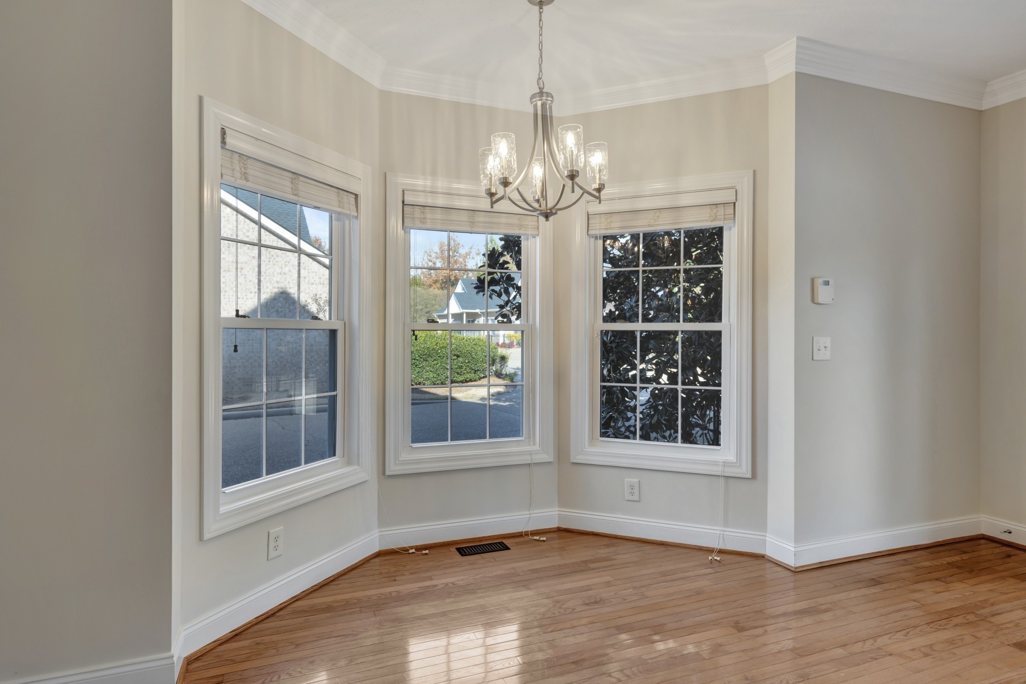 1900 Tinnin Road, Unit A5 Goodlettsville, TN 37072 - Photo 12 of 41 a view of an empty room with a window and chandelier