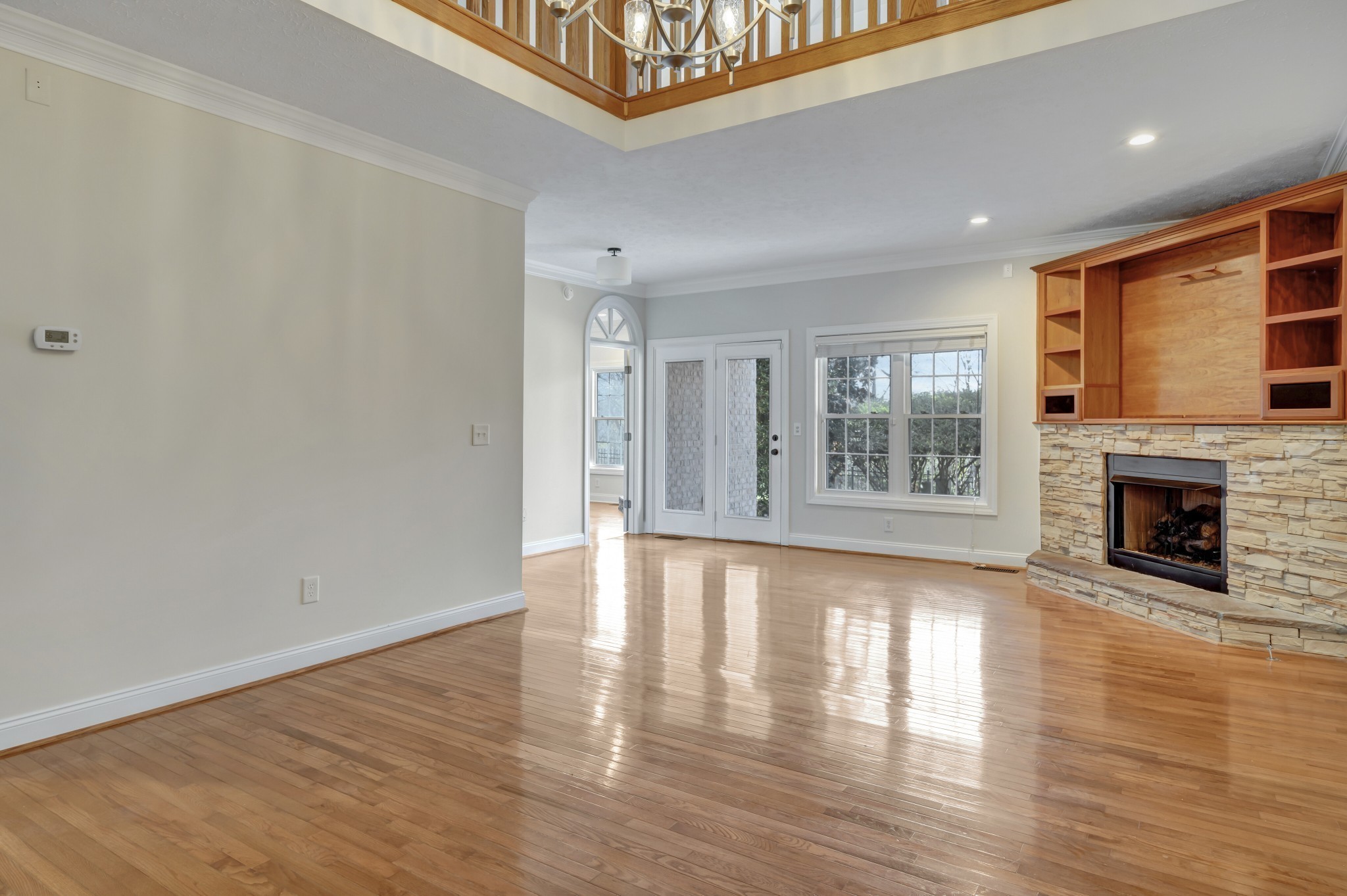 1900 Tinnin Road, Unit A5 Goodlettsville, TN 37072 - Photo 13 of 41 a view of an empty room with a window and fireplace