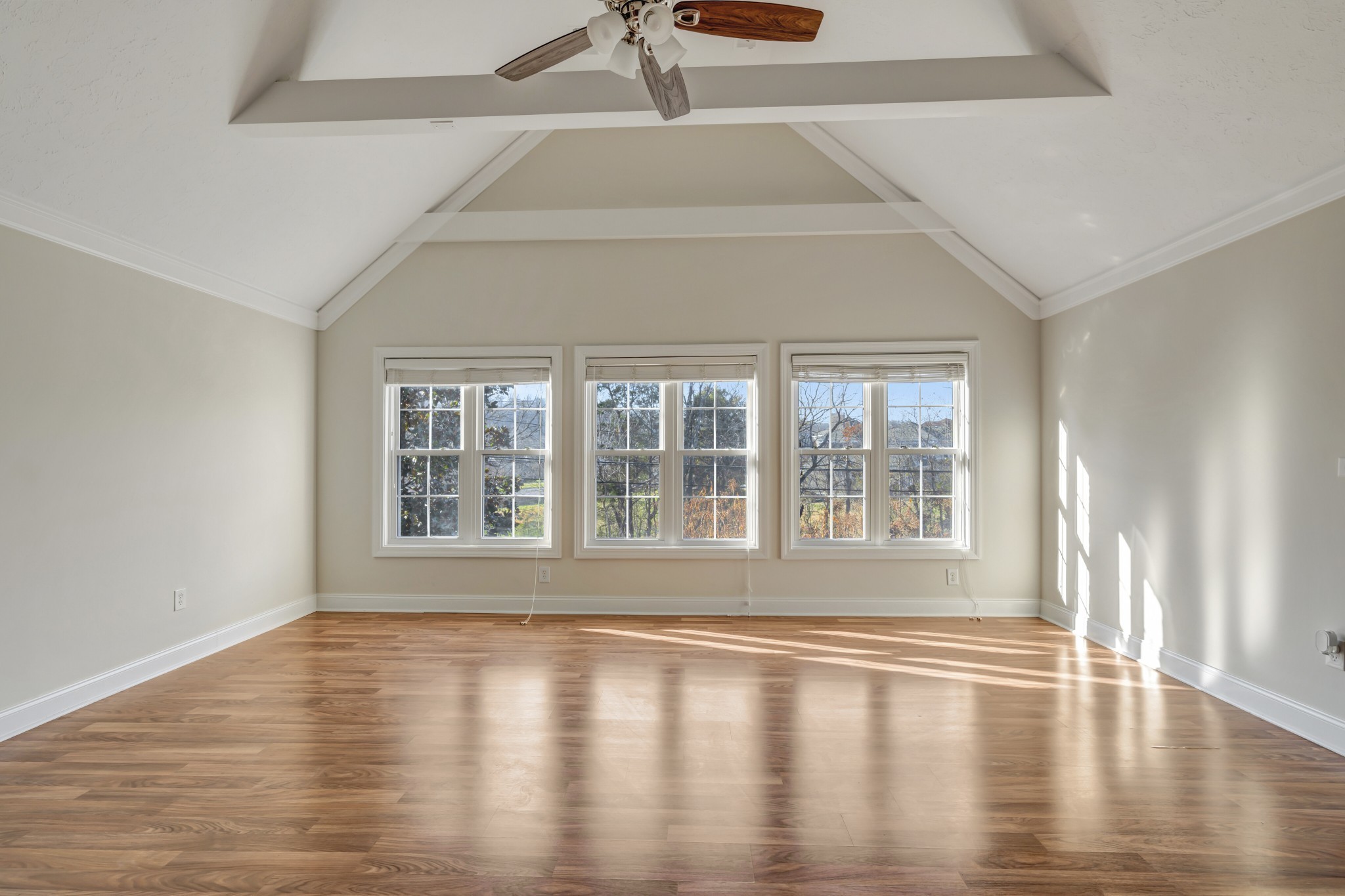 1900 Tinnin Road, Unit A5 Goodlettsville, TN 37072 - Photo 25 of 41 a view of an empty room with wooden floor and a window
