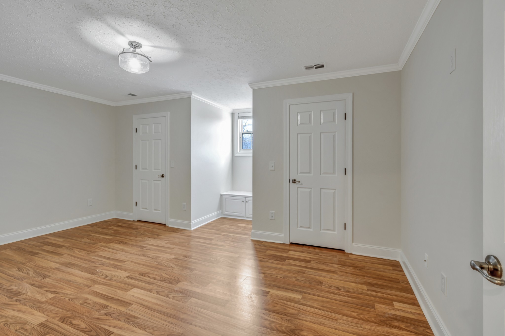 1900 Tinnin Road, Unit A5 Goodlettsville, TN 37072 - Photo 34 of 41 a view of empty room with wooden floor and ceiling fan