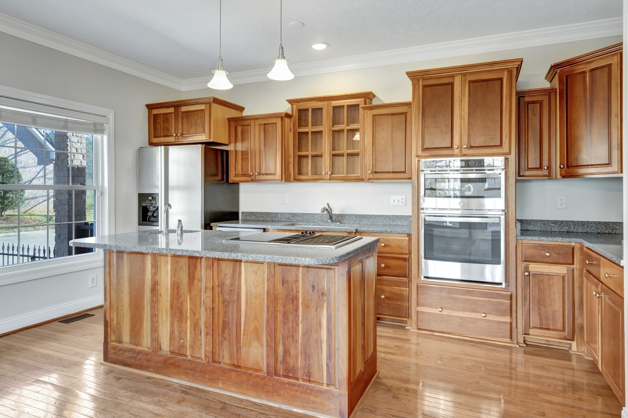 1900 Tinnin Road, Unit A5 Goodlettsville, TN 37072 - Photo 9 of 41 a kitchen with stainless steel appliances granite countertop a stove and a refrigerator