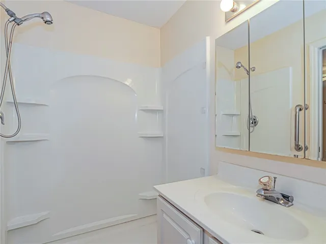 a backyard of a house with palm trees