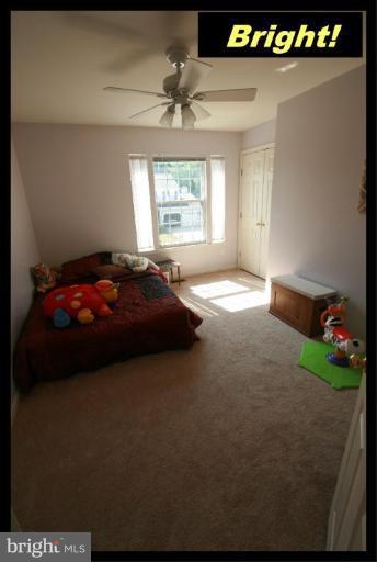 726 Monarch Ridge Road Frederick, MD 21703 - Photo 4 of 12 a bedroom with a bed and a window