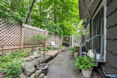a view of a yard with patio