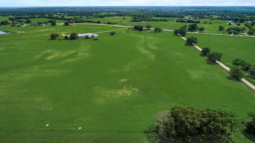 2 Co Road Kaufman, TX 75142 - Photo 5 of 7 an aerial view of green field with trees