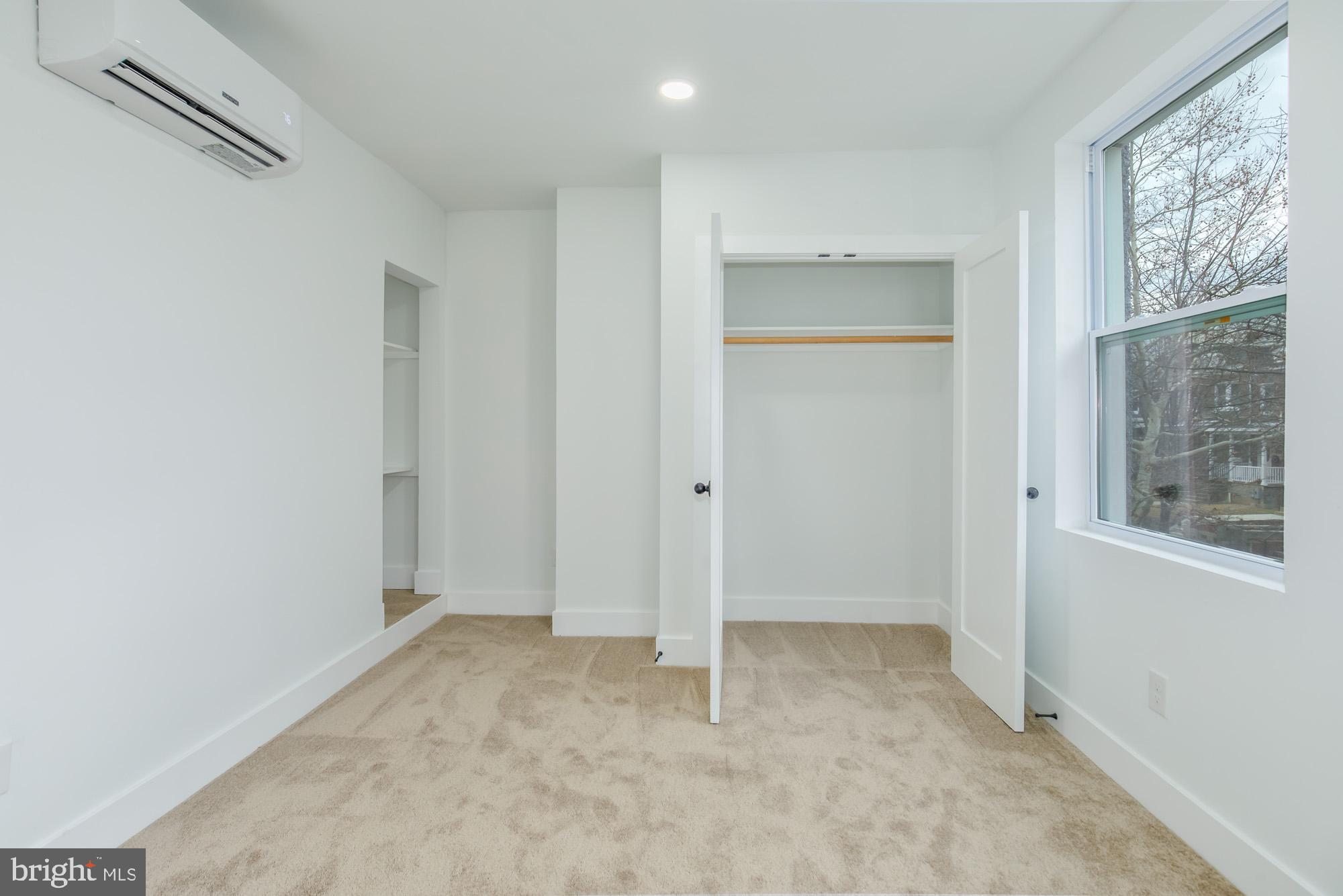 745 Kenyon Street Northwest Washington, DC 20010 - Photo 11 of 27 a view of an empty room with a window