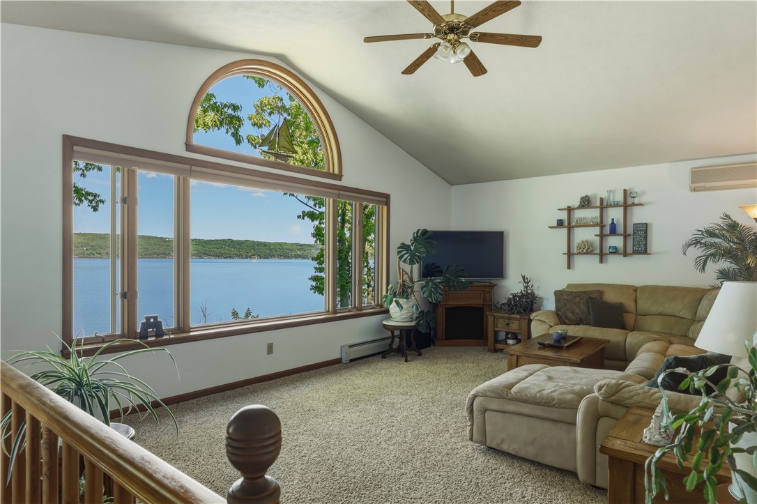 5580 Peach Orchard Road Hector, NY 14841 - Photo 32 of 50 Main level living space with expansive lake views!