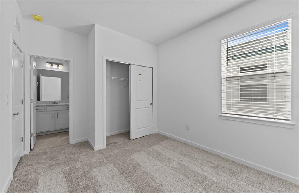 4147 Feldspar Lane Spring Hill, FL 34609 - Photo 14 of 22 a view of an empty room with a window