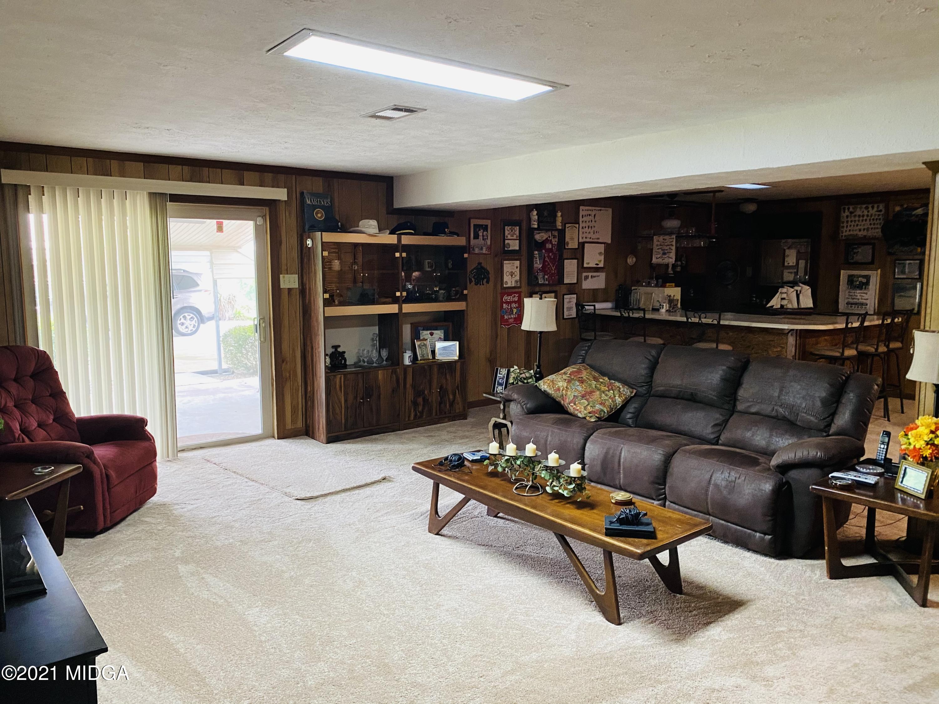 448 Huckabee Road Gray, GA 31032 - Photo 9 of 13 a living room with furniture and a window