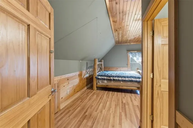 a view of a balcony with wooden floor