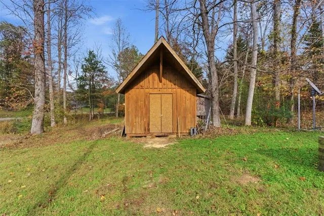 a view of backyard with green space