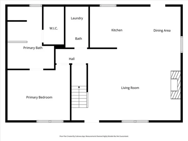 a picture of a room with a refrigerator