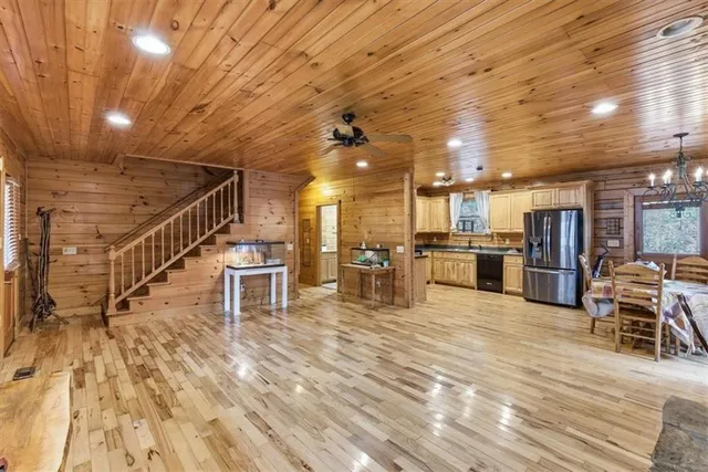 a view of kitchen with furniture and a table