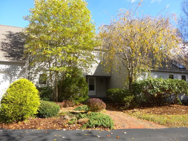 258 Huckins Neck Road Centerville, MA 02601 - Photo 1 of 30 a front view of a house with a yard