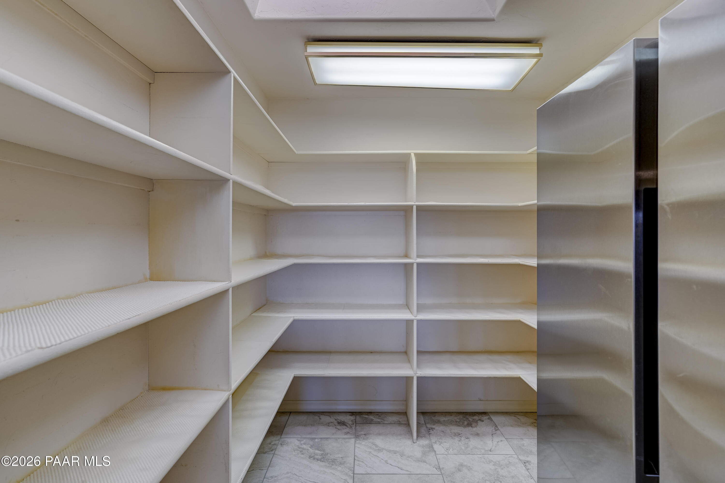 180 Partridge Lane Prescott, AZ 86303 - Photo 11 of 80 a view of walk in closet with empty racks