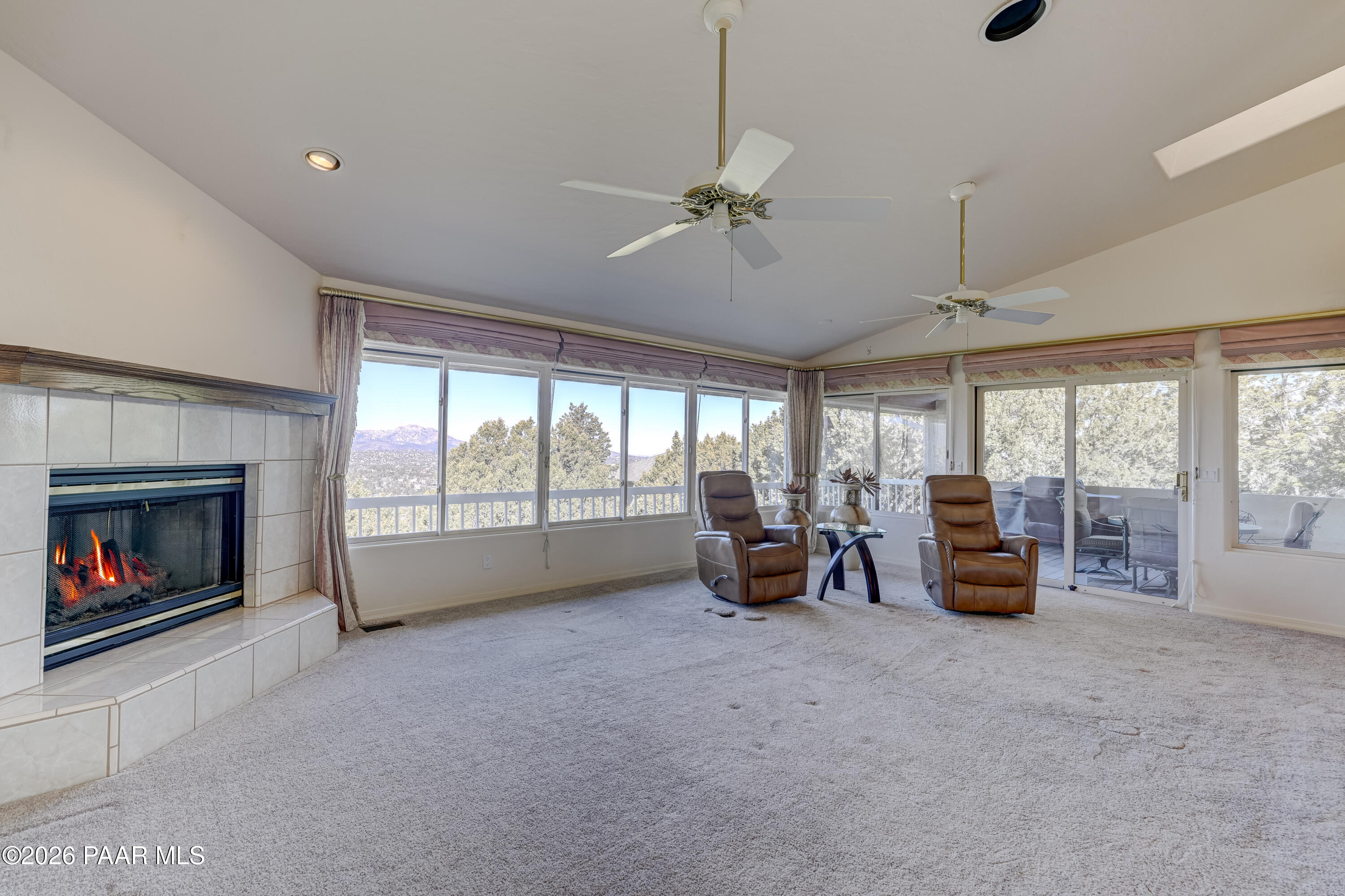 180 Partridge Lane Prescott, AZ 86303 - Photo 15 of 80 a view of a room with furniture fireplace and windows
