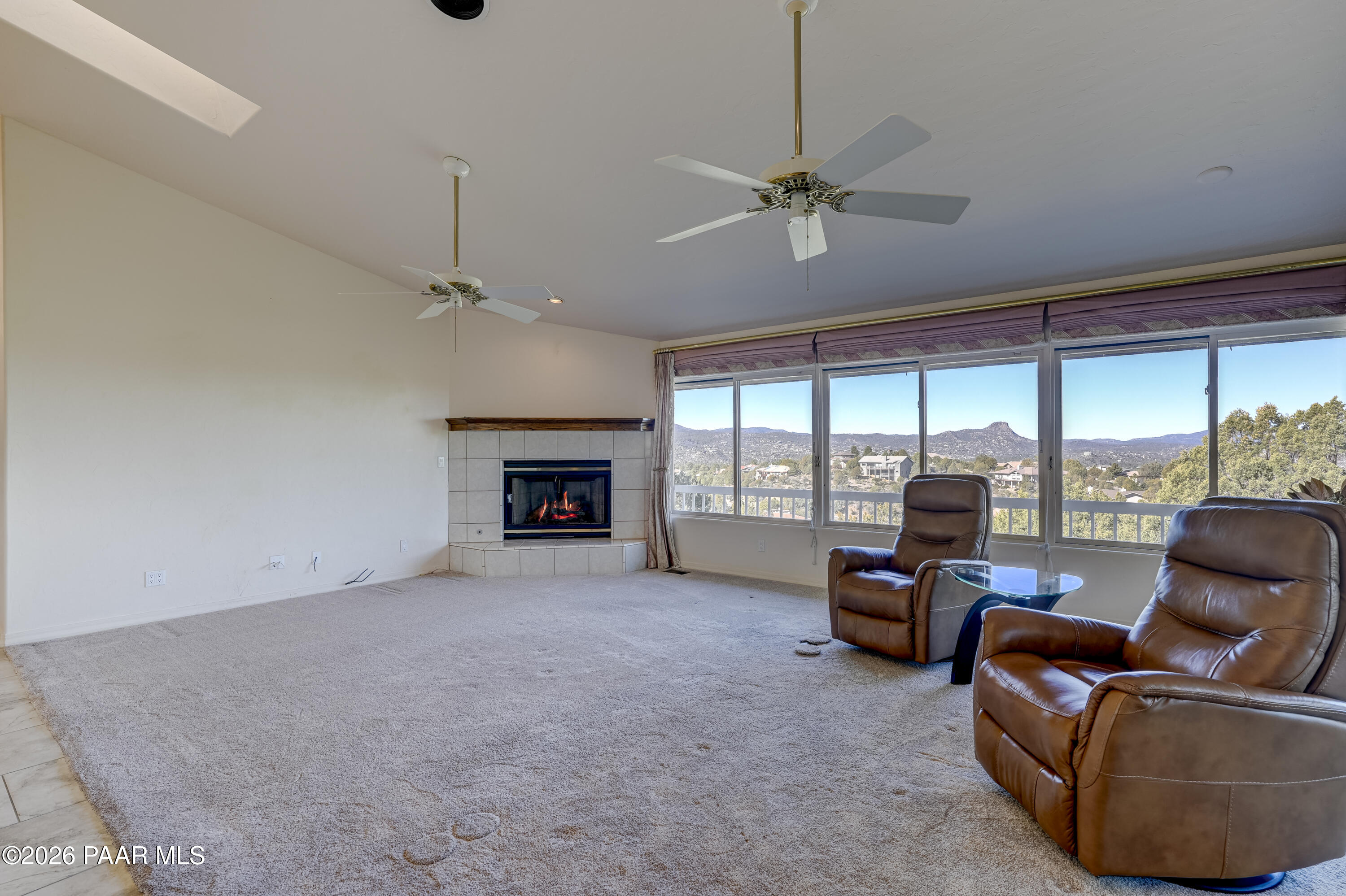 180 Partridge Lane Prescott, AZ 86303 - Photo 16 of 80 a living room with furniture and a fireplace