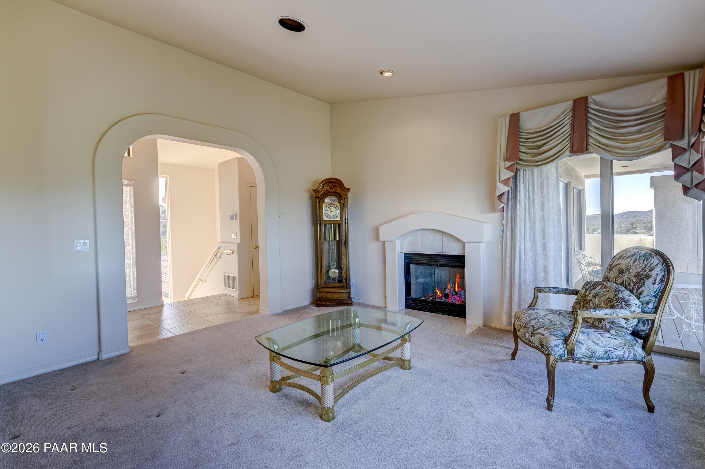 180 Partridge Lane Prescott, AZ 86303 - Photo 22 of 80 a living room with furniture and a fireplace