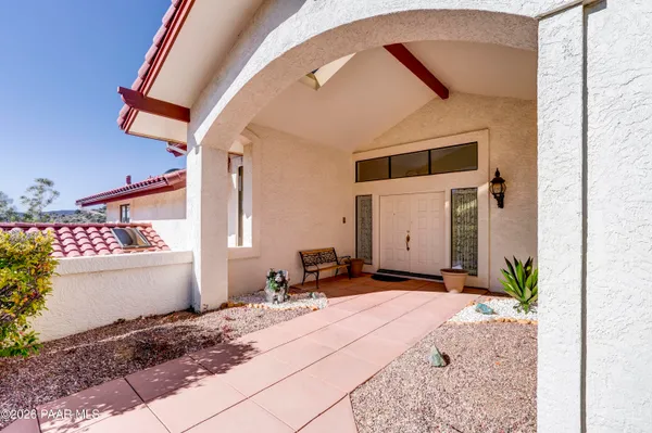 a kitchen with stainless steel appliances a stove a refrigerator and a sink