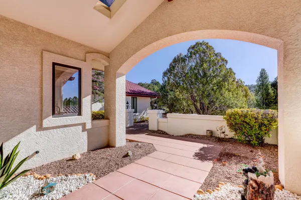 a kitchen with a sink stove and refrigerator
