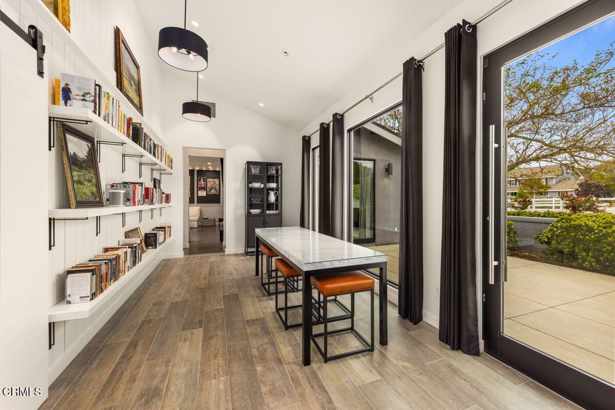 291 Saddle Lane Ojai, CA 93023 - Photo 11 of 47 a room with lots of furniture and a chandelier