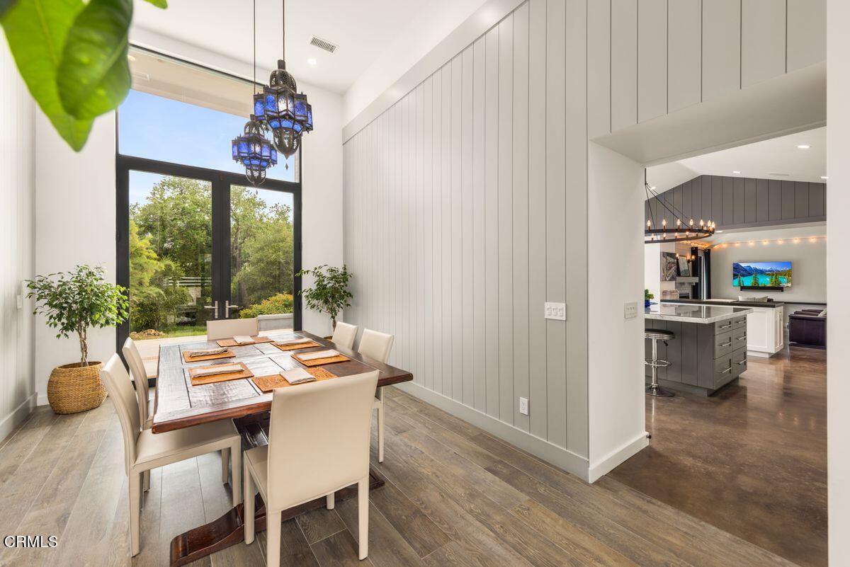 291 Saddle Lane Ojai, CA 93023 - Photo 14 of 47 a dining room with furniture window and wooden floor