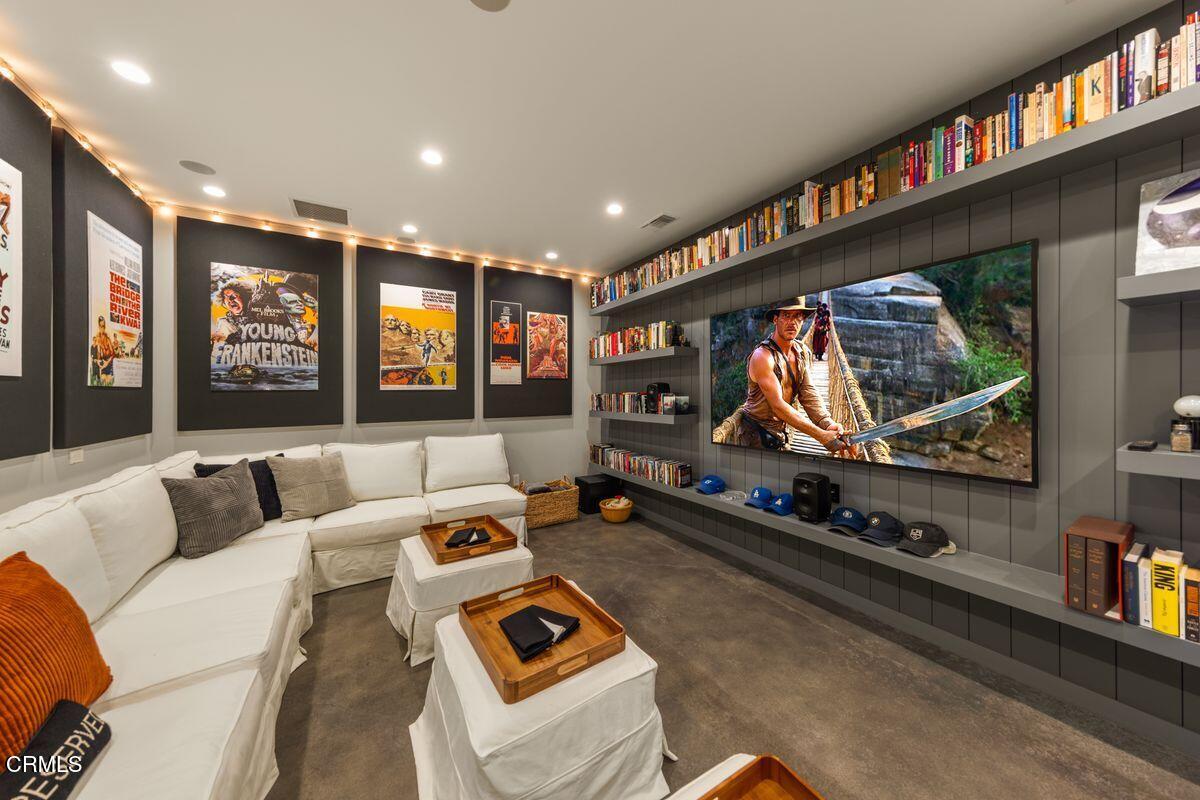 291 Saddle Lane Ojai, CA 93023 - Photo 17 of 47 a living room with furniture gym equipment and a flat screen tv