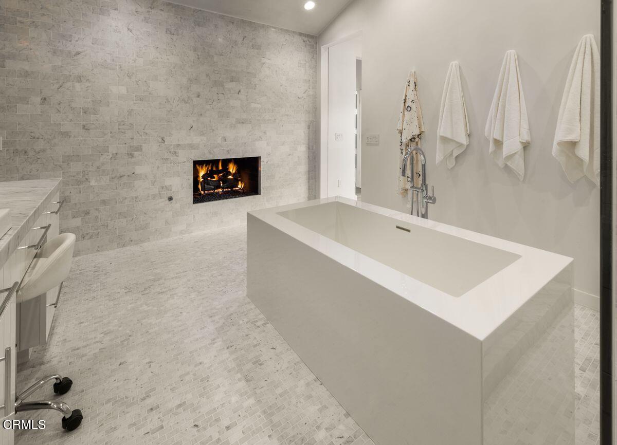 291 Saddle Lane Ojai, CA 93023 - Photo 21 of 47 a bathroom with a sink a mirror and a shower