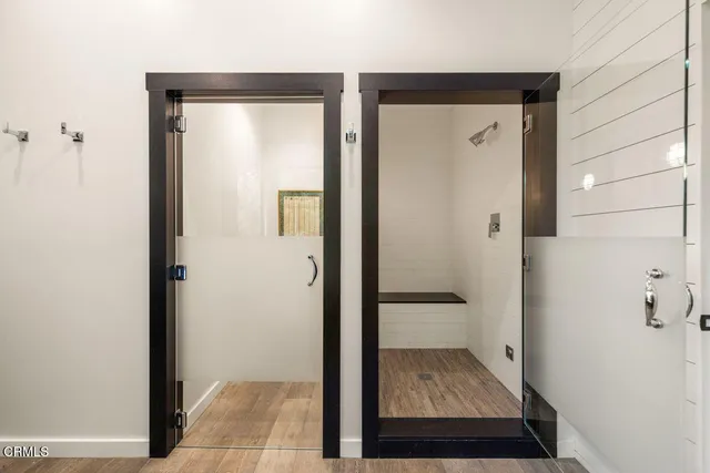 a bed room with a bed and a chair