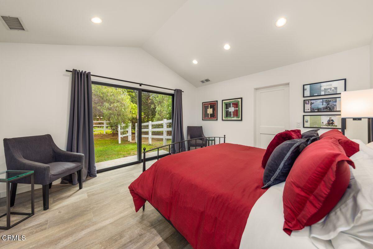 291 Saddle Lane Ojai, CA 93023 - Photo 25 of 47 a bed room with a bed and a chair