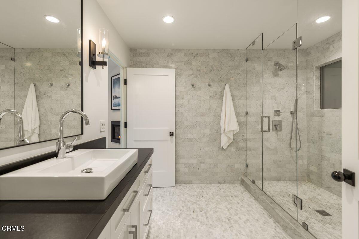 291 Saddle Lane Ojai, CA 93023 - Photo 26 of 47 a bathroom with a sink shower and a mirror