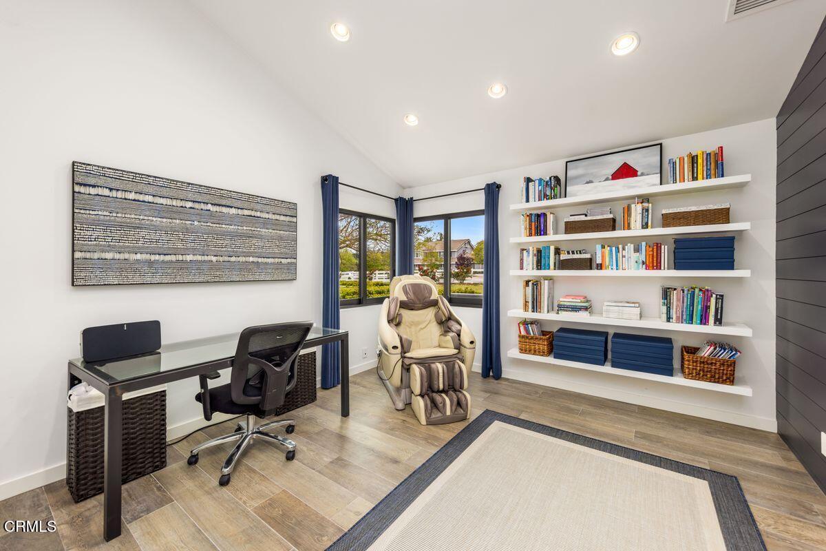 291 Saddle Lane Ojai, CA 93023 - Photo 29 of 47 a work room with furniture and a bookshelf