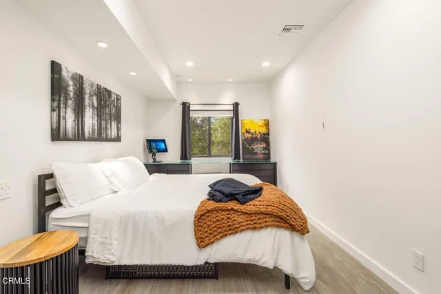 a view of a balcony with two chairs and a table