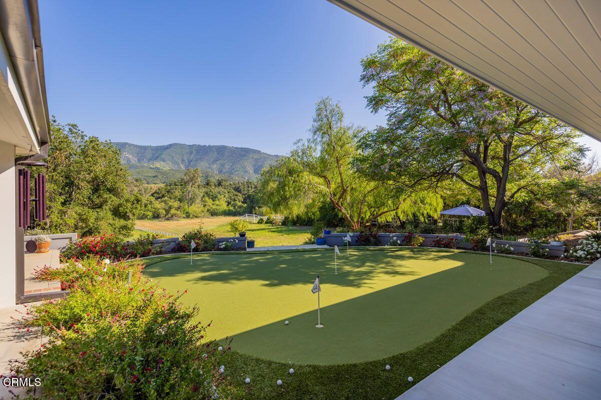291 Saddle Lane Ojai, CA 93023 - Photo 36 of 47 a view of a swimming pool with a yard and large trees