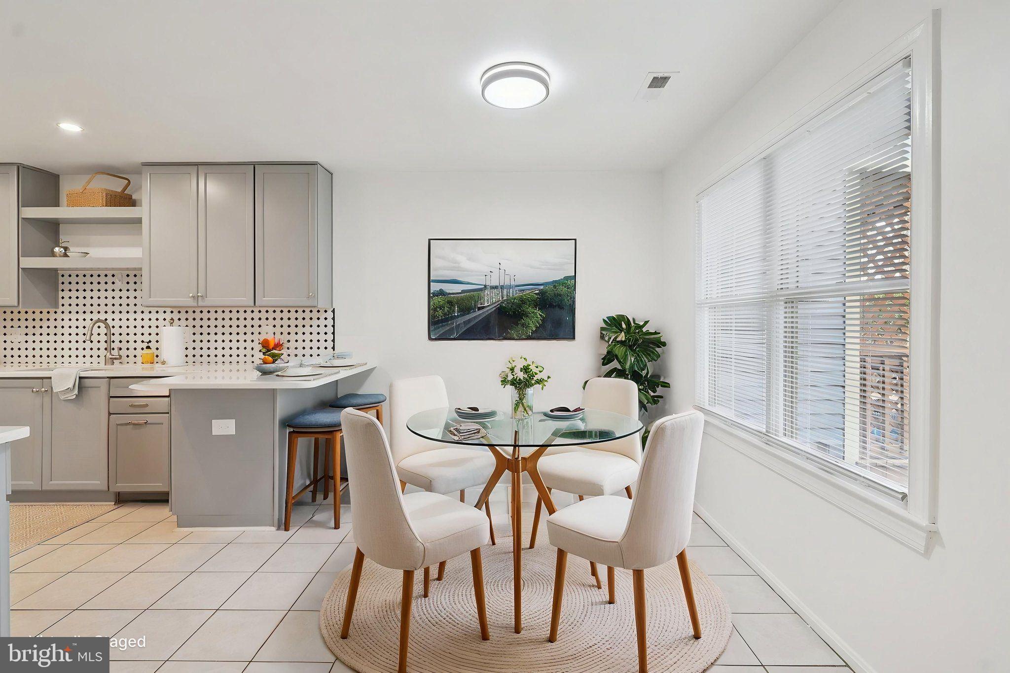 770 Bellefield Road, Unit 107 Solomons, MD 20629 - Photo 13 of 66 Virtually Staged Dining Area