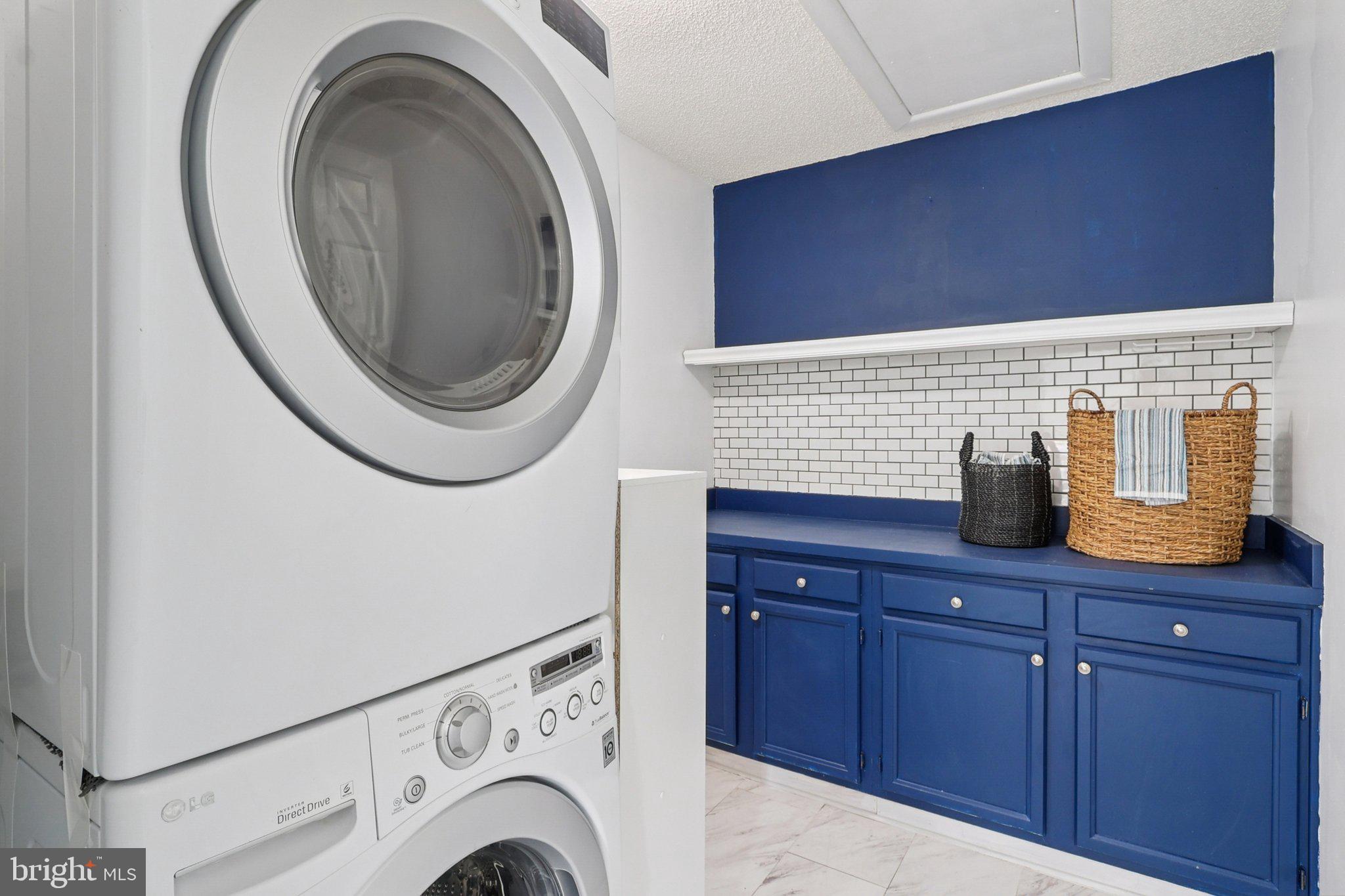 770 Bellefield Road, Unit 107 Solomons, MD 20629 - Photo 21 of 66 Upper Level Laundry Room with cabinetry