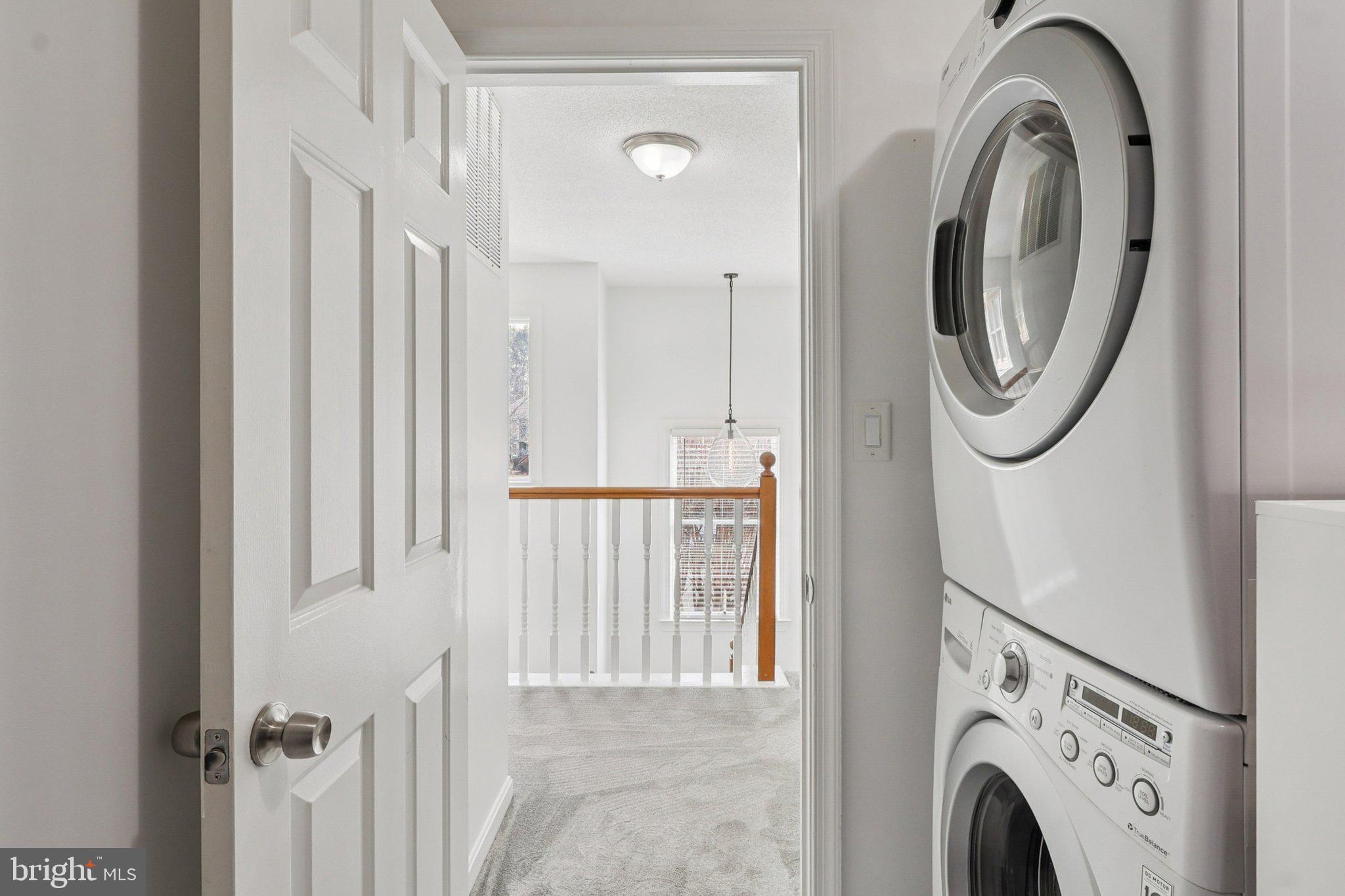 770 Bellefield Road, Unit 107 Solomons, MD 20629 - Photo 22 of 66 Access to excellent attic storage in laundry room