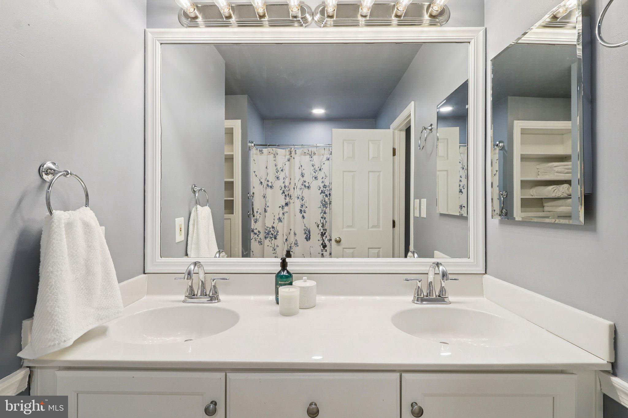 770 Bellefield Road, Unit 107 Solomons, MD 20629 - Photo 34 of 66 Primary Bath w/ double sinks