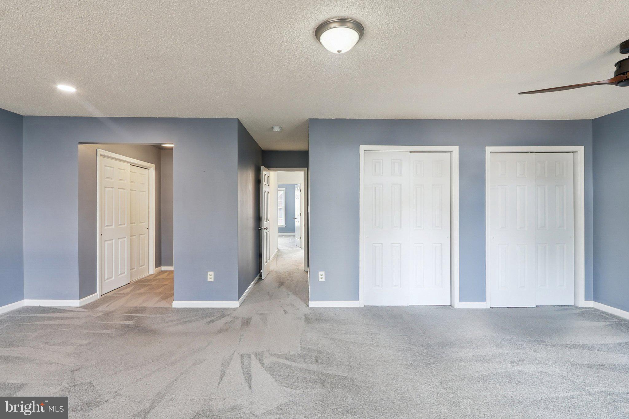 770 Bellefield Road, Unit 107 Solomons, MD 20629 - Photo 35 of 66 Primary Bedroom looking into upstairs hall