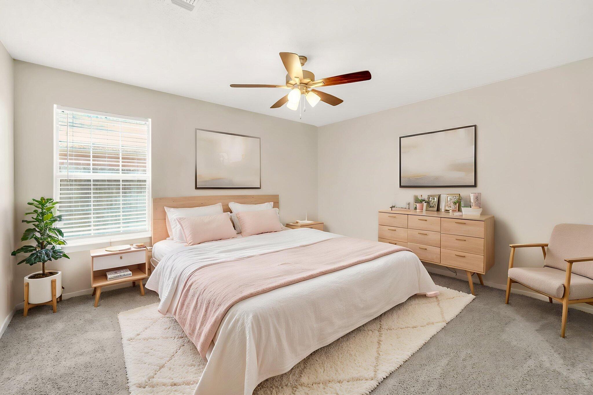 1036 Blue Ridge Drive Fort Walton Beach, FL 32547 - Photo 20 of 31 a bedroom with a bed and a couch