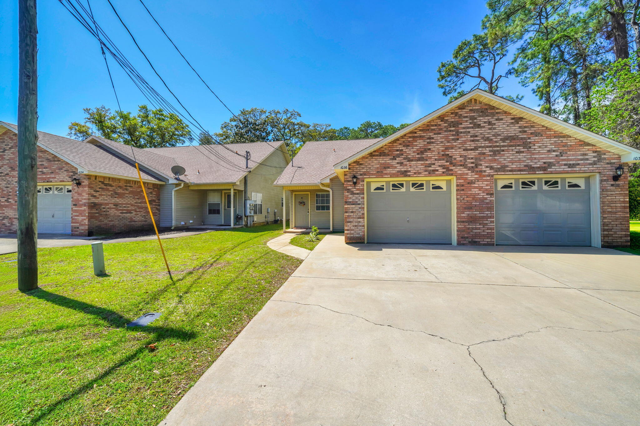 1036 Blue Ridge Drive Fort Walton Beach, FL 32547 - Photo 2 of 31 a view of a house with backyard