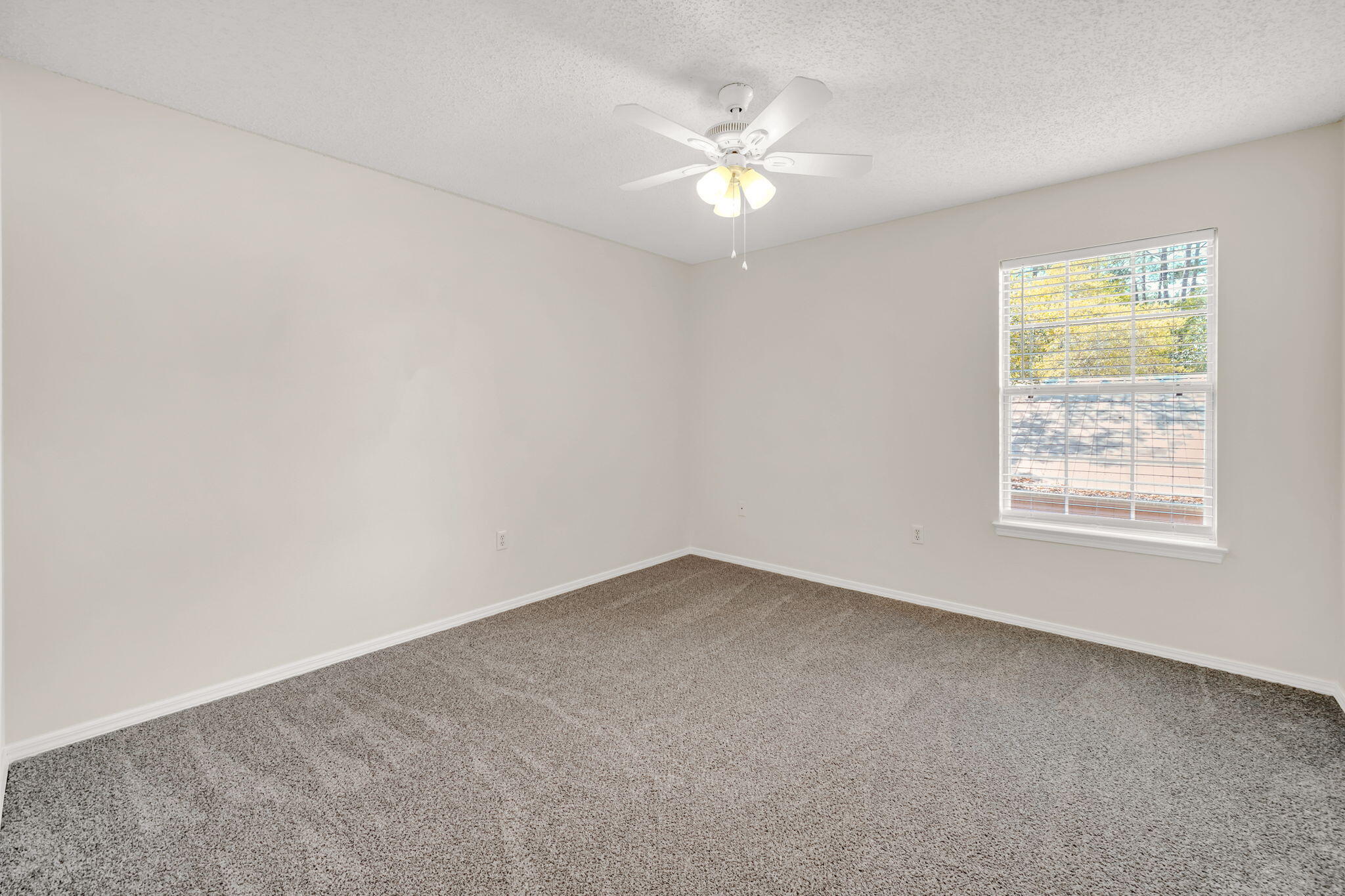 1036 Blue Ridge Drive Fort Walton Beach, FL 32547 - Photo 25 of 31 an empty room with a window