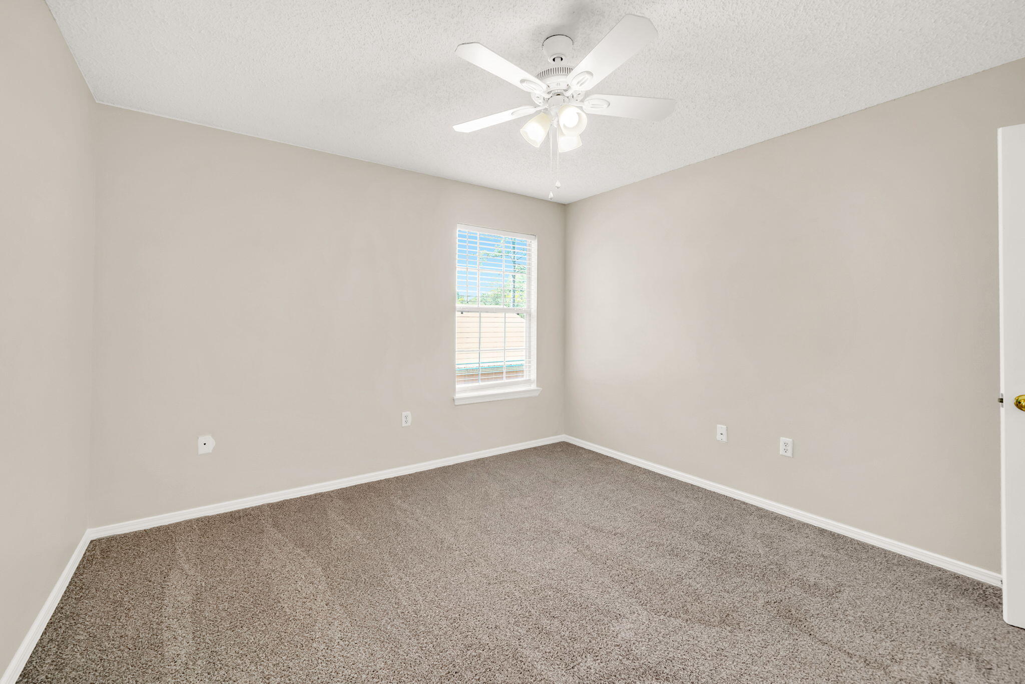 1036 Blue Ridge Drive Fort Walton Beach, FL 32547 - Photo 26 of 31 an empty room with a window