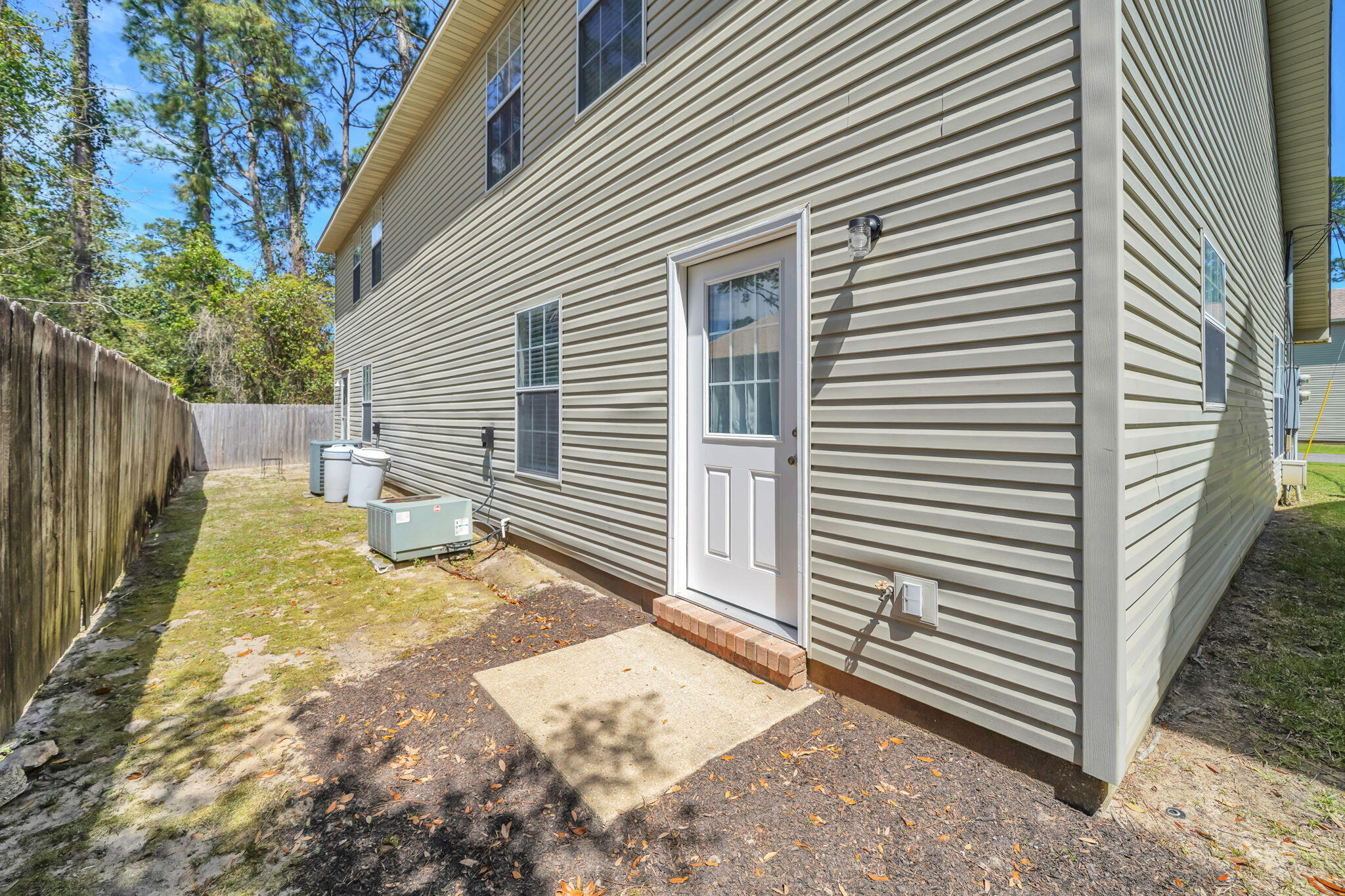1036 Blue Ridge Drive Fort Walton Beach, FL 32547 - Photo 29 of 31 a view of a back yard of the house