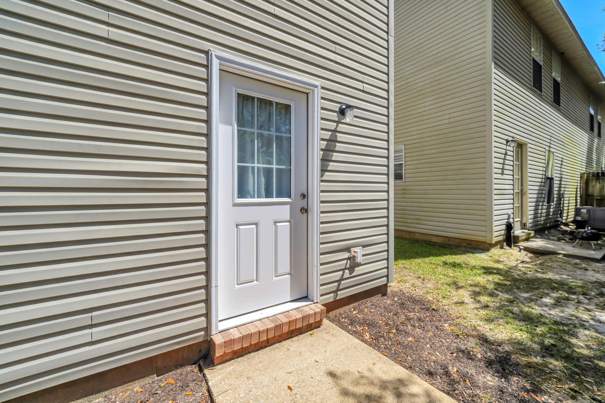 1036 Blue Ridge Drive Fort Walton Beach, FL 32547 - Photo 31 of 31 a view of a house with a white door