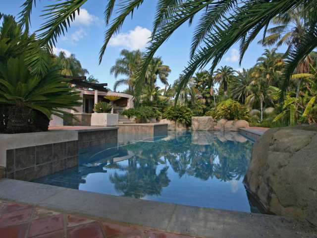 7024 Rancho Cielo Rancho Santa Fe, CA 92067 - Photo 11 of 25 POOL IN TROPICAL SETTING