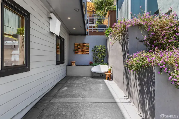 a potted plant sitting in front of a door