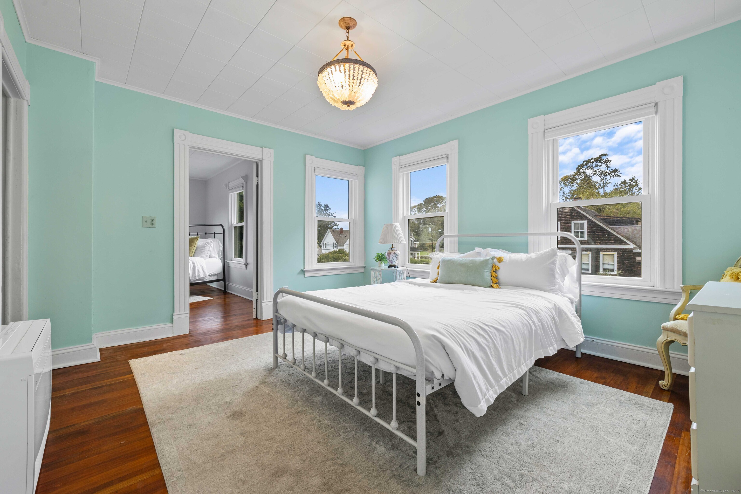 16 Prospect Hill Road Groton, CT 06340 - Photo 25 of 38 a bedroom with a bed lamp and a window